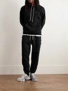 Nike - Solo Swoosh Tapered Logo-Embroidered Cotton-Blend Jersey Sweatpants - Black