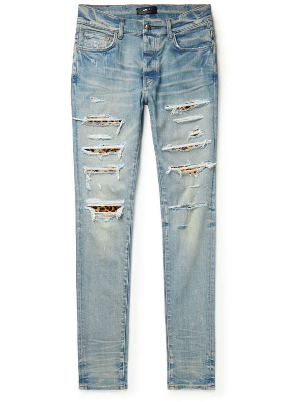 Photo: AMIRI - Thrasher Skinny-Fit Distressed Panelled Jeans - Blue