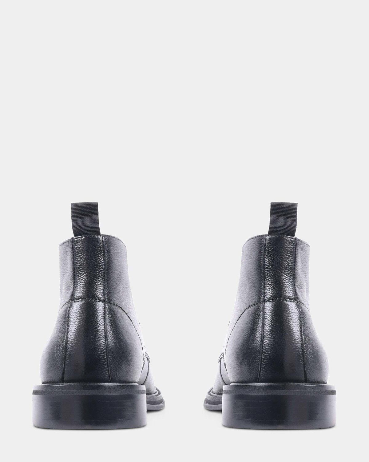 Steve Madden Sentinel Boots in Black