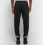 Fendi - Bag Bugs Tapered Appliquéd Loopback Cotton-Jersey Sweatpants - Men - Black