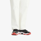Air Jordan 11 Retro Low in Black/Red/White