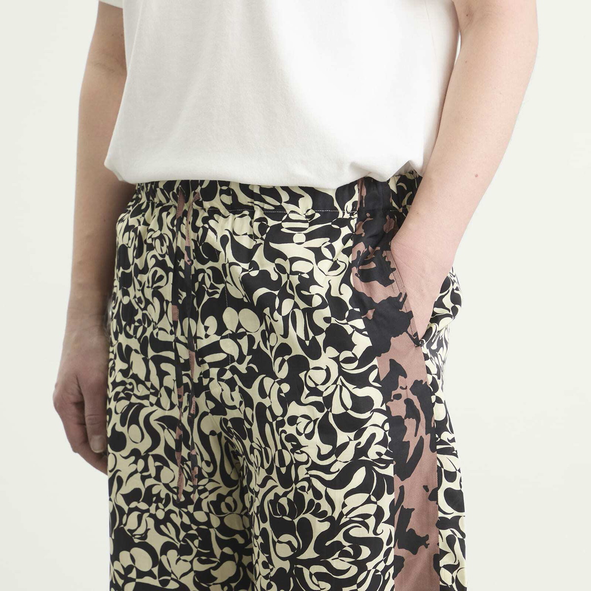 Dries Van Noten Men's Squiggle Border Print Shorts in Black