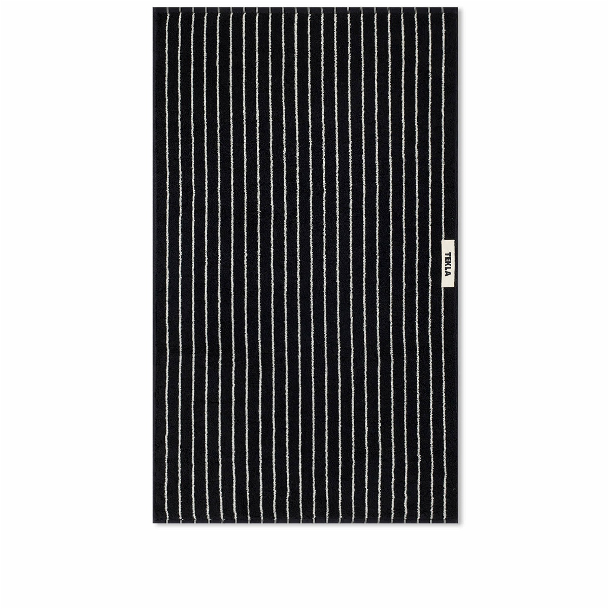 Photo: Tekla Fabrics Organic Terry Hand Towel in Black Stripes