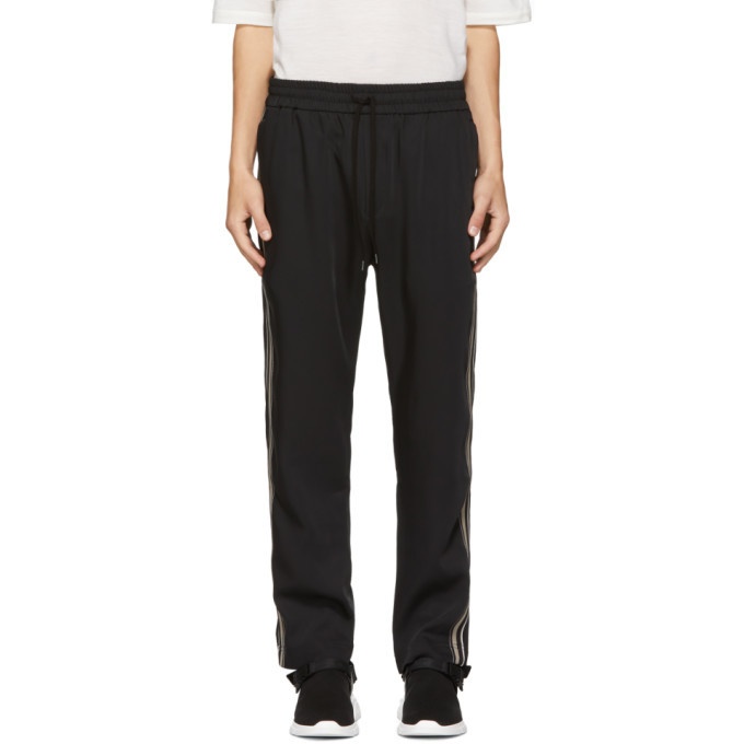 Photo: CMMN SWDN Black and Beige Buck Track Pants