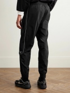 Nike - Solo Swoosh Logo-Embroidered Nylon Track Pants - Black