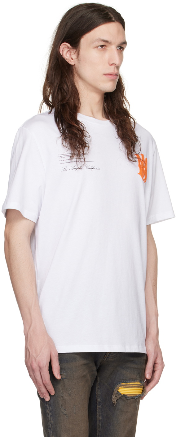 【送料&関税込】AMIRI T-shirt In White Cotton AMIRI logo-print Cotton T-shirt | White | FARFETCH
