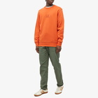 C.P. Company Men's Garment Dyed Centre Logo Crew Sweat in Harvest Pumpkin