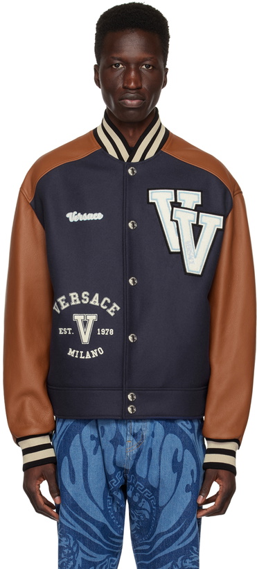 Photo: Versace Navy Varsity Down Bomber Jacket