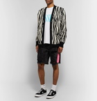 AMIRI - Thrasher Neon-Striped Distressed Denim Shorts - Men - Black