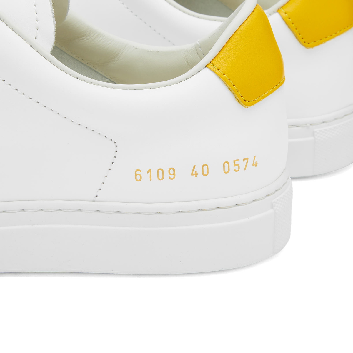 Woman by Common Projects Women's Retro Low Sneakers in White