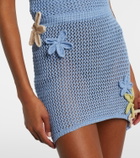 Bananhot Cori open-knit lamé miniskirt