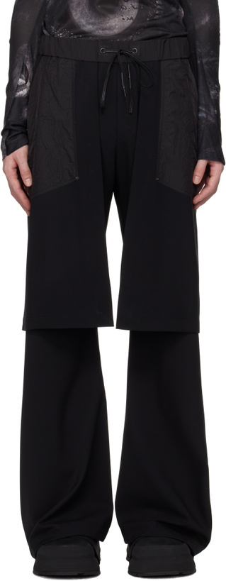 Photo: CARNET-ARCHIVE Black Skirt Trousers