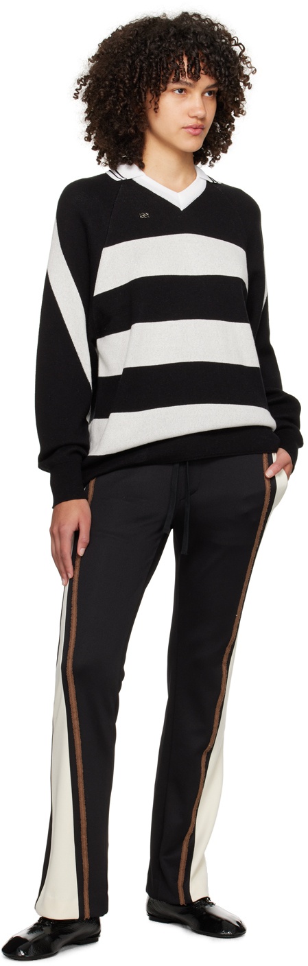 adidas Originals Three Stripe Flared Track Pants In Black | ASOS