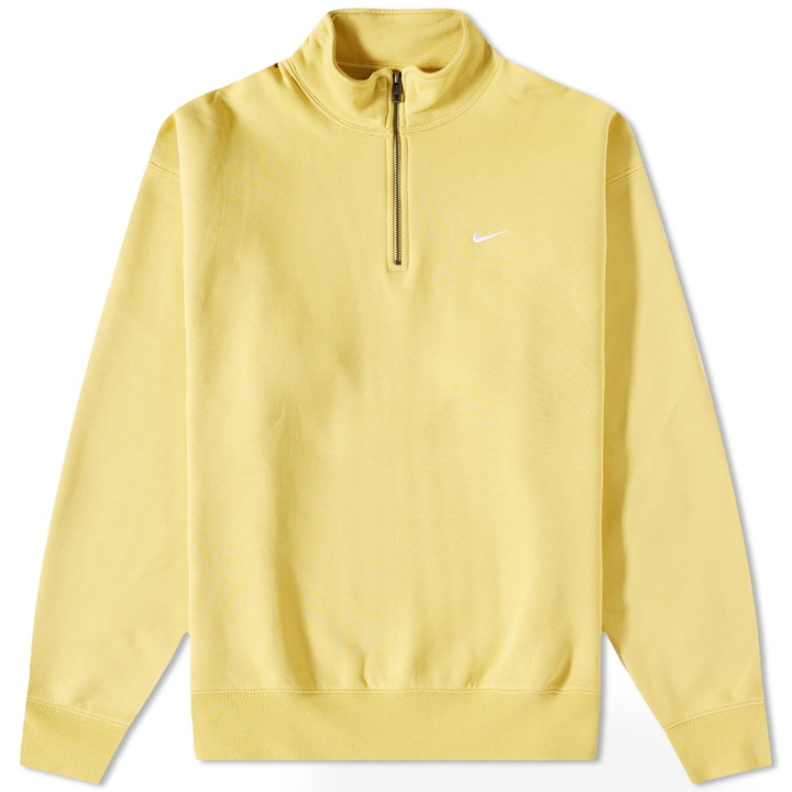 Photo: Nike Men's Solo Swoosh Quarter-Zip in Saturn Gold/White