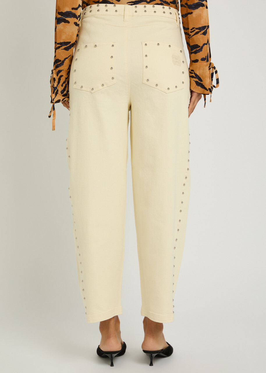 Never Fully Dressed Studded Barrel-leg Jeans Ecru