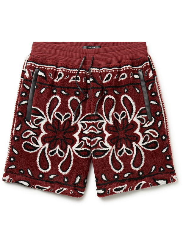 Photo: AMIRI - Wide-Leg Leather-Trimmed Bandana-Print Fleece Drawstring Shorts - Burgundy