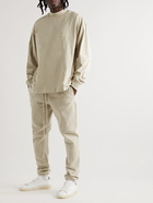 FEAR OF GOD ESSENTIALS - Slim-Fit Tapered Logo-Flocked Cotton-Blend Jersey Sweatpants - Neutrals