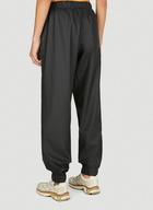 Rains - Coated Track Pants in Black