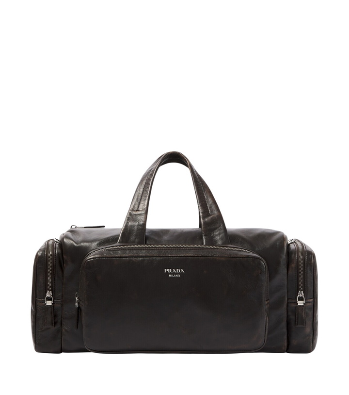 Photo: Prada Distressed leather duffel bag