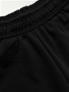 VETEMENTS - Wide-Leg Logo-Print Cotton-Jersey Sweatpants - Black