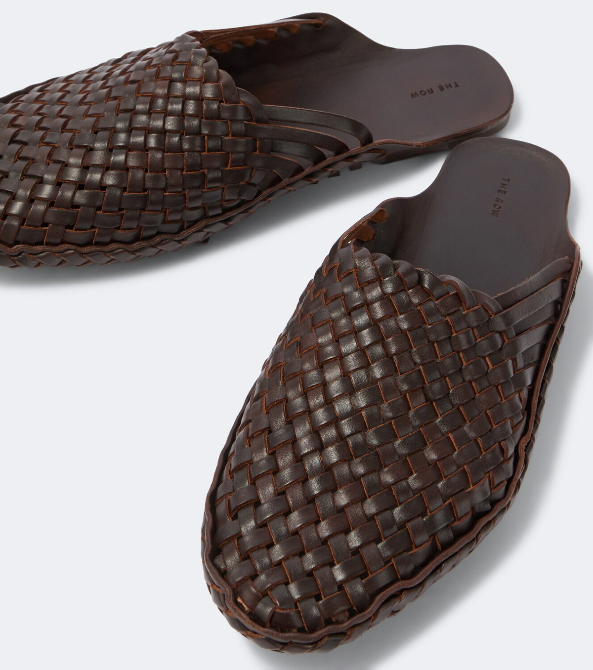 The Row Woven leather slip-on shoes