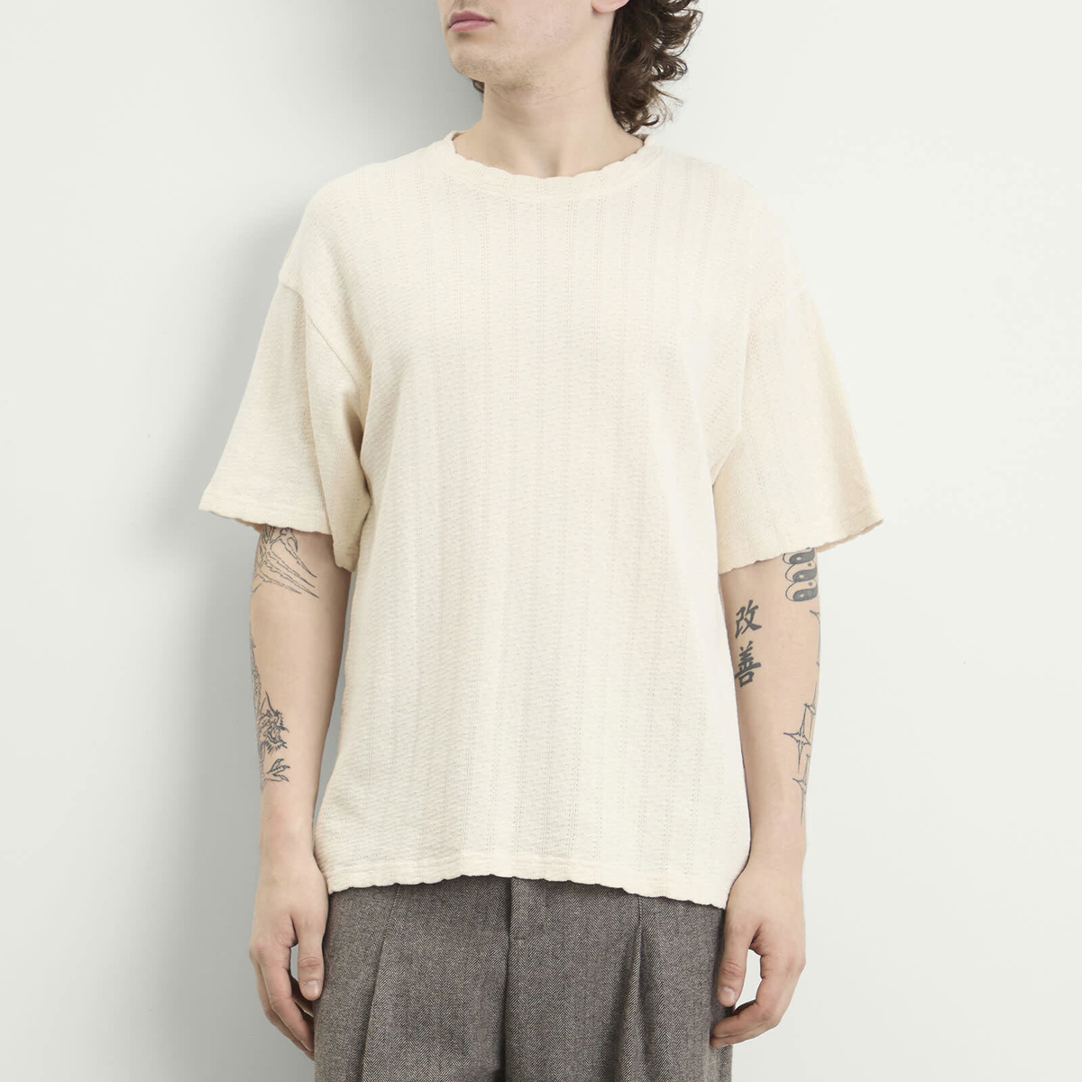 A Kind of Guise Men's Thuy Open Knit T-Shirt in Aran Creme