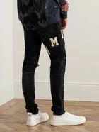 AMIRI - Skinny-Fit Logo-Appliquéd Distressed Jeans - Black