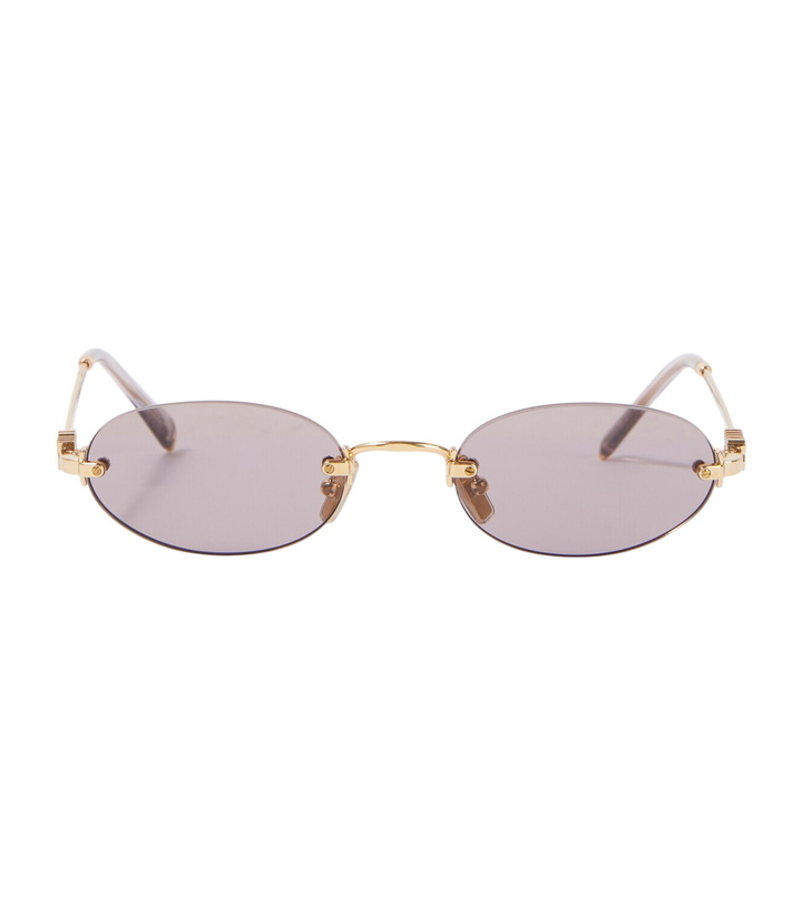 Photo: Miu Miu Logo oval sunglasses