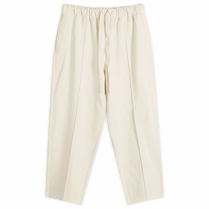 Photo: Merely Made Men's Pintuck Wide Trousers in Neutral