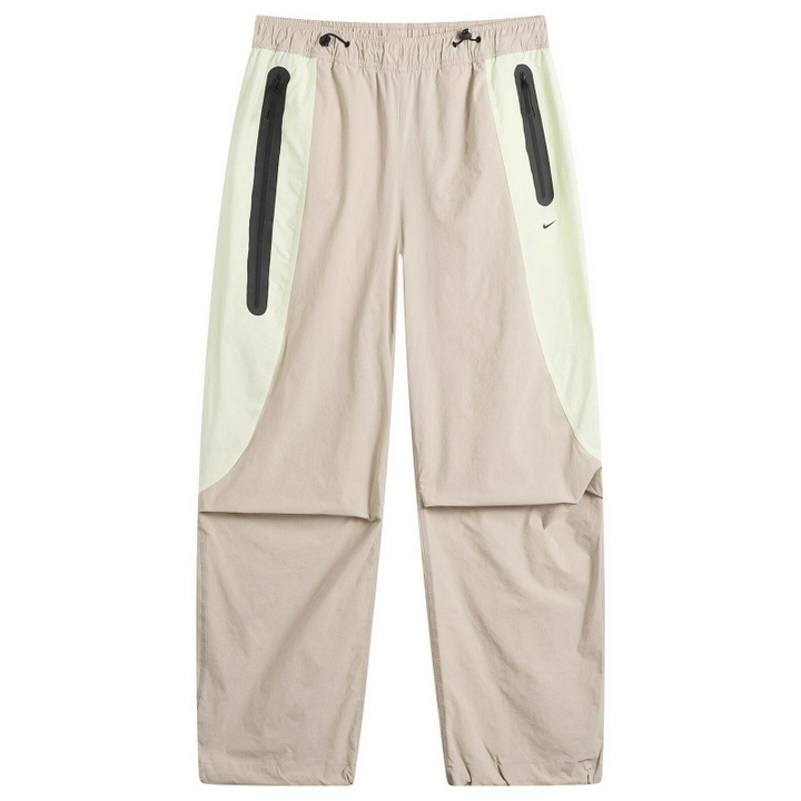 Photo: Nike Men's Tech Woven Pro Oversized Pant in Cream/Volt Tint/Black