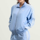 Adidas Women's Denim Firebird Tracktop in Light Denim