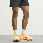 Nike Running Men's Nike Vomero Plus Sneaker in Citron Pulse/Blue Void/Alabaster