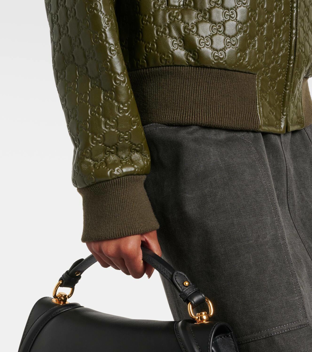 Gucci GG embossed leather bomber jacket