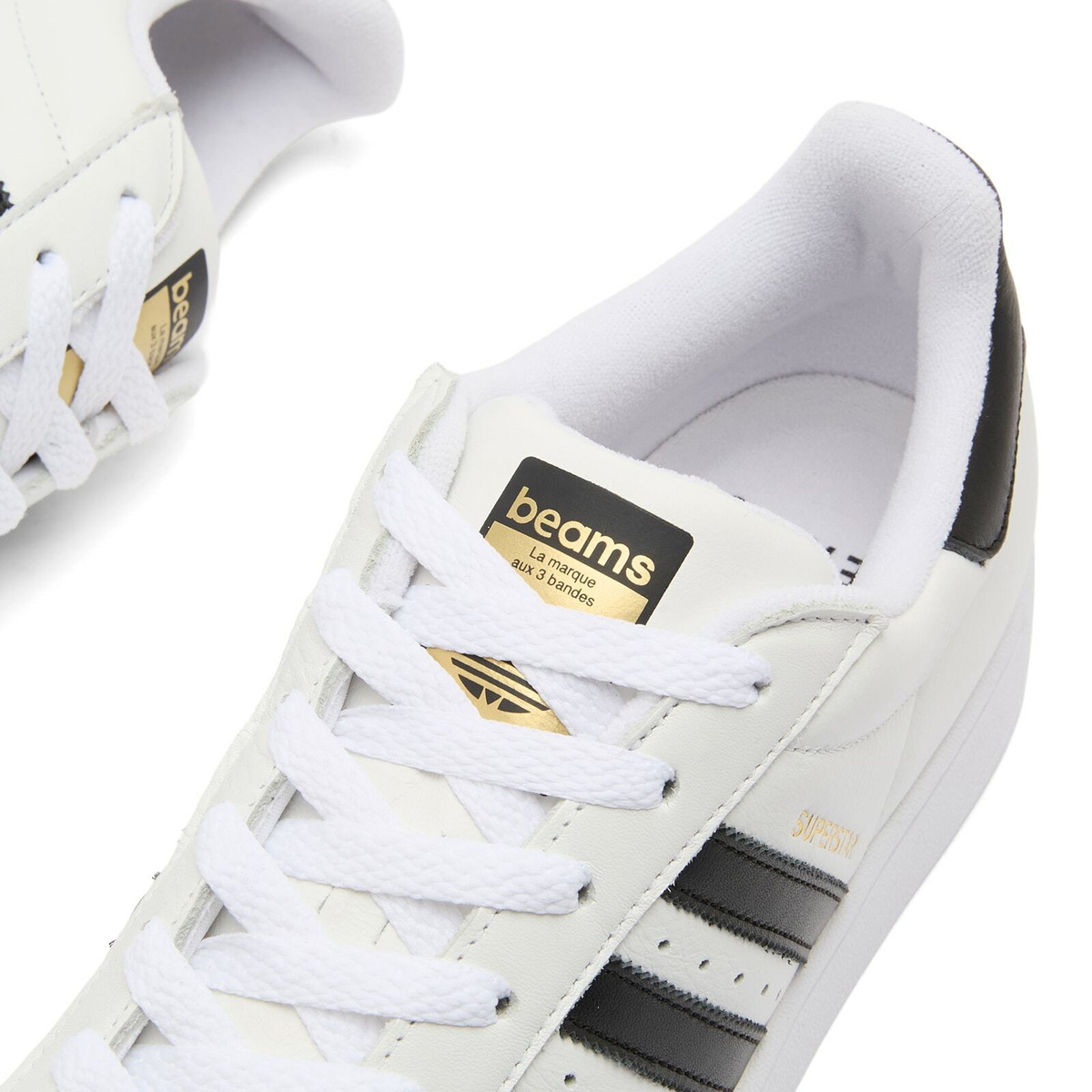 Adidas x Beams Superstar Sneaker in White/Core Black/Gold