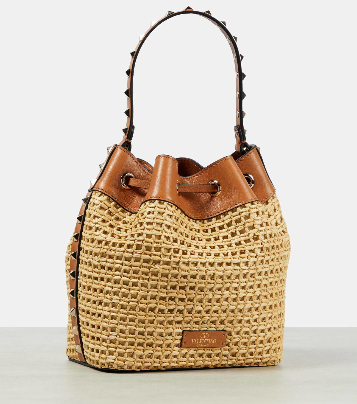 Valentino Garavani Rockstud raffia bucket bag Valentino Garavani