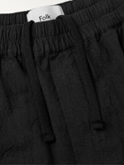 Folk - Tapered Crinkled Linen and Cotton-Blend Trousers - Black