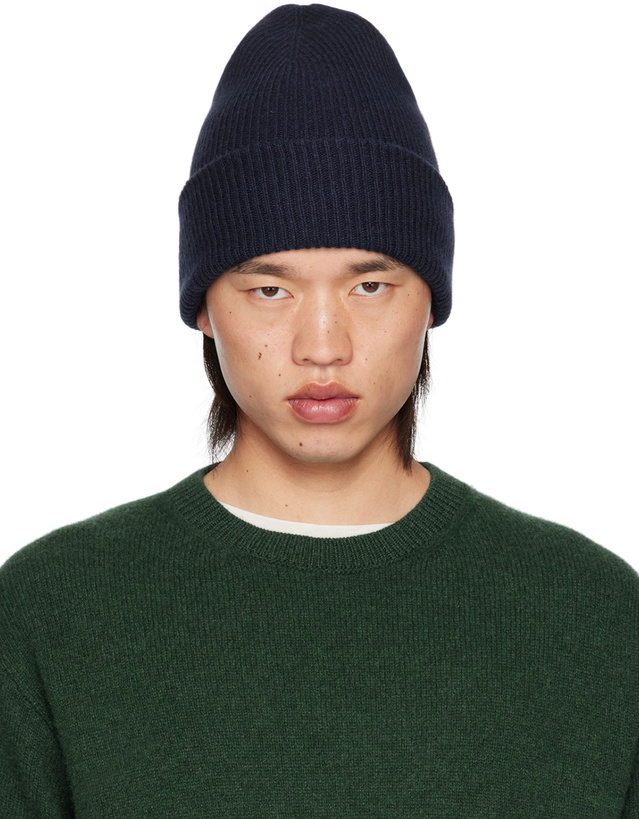 Photo: The Elder Statesman Navy Parker Beanie