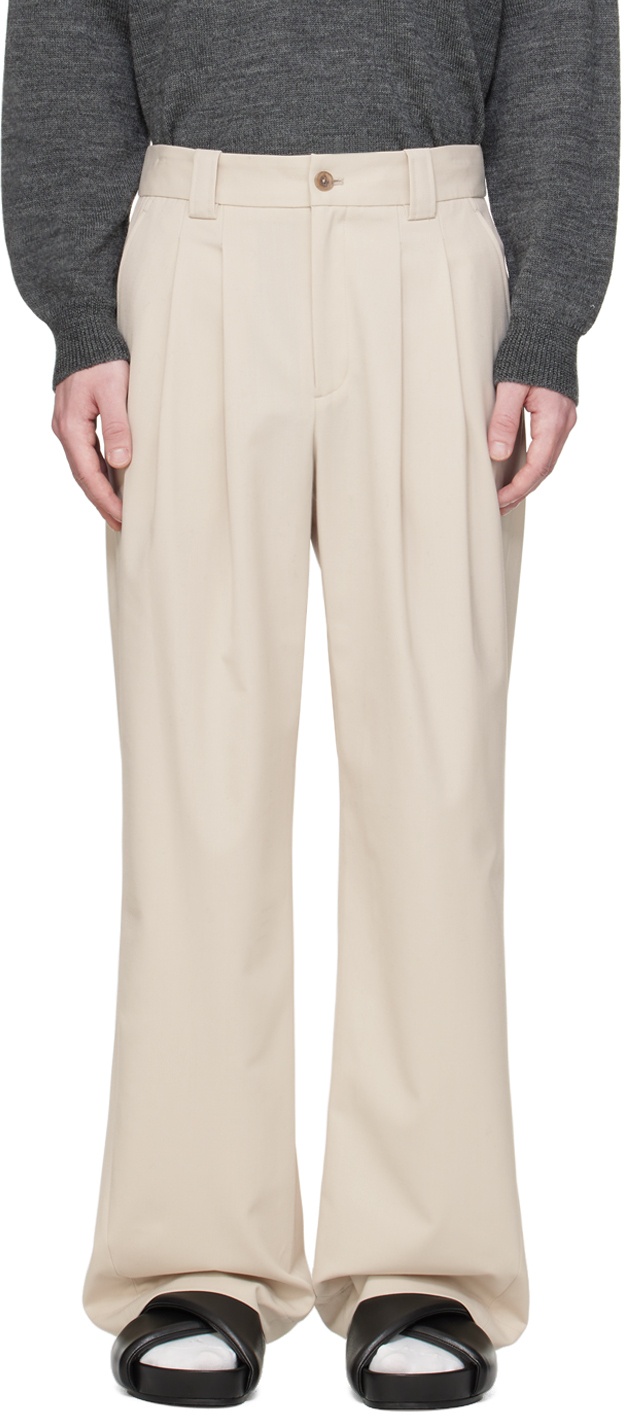 Photo: Commission Beige Pleated Trousers