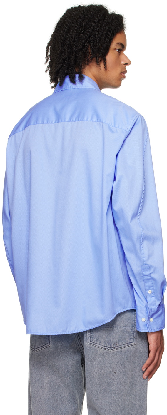 Light shops blue ruffle shirt