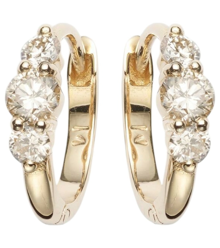 Photo: Ileana Makri Rivulet Small 14kt gold hoop earrings with diamonds
