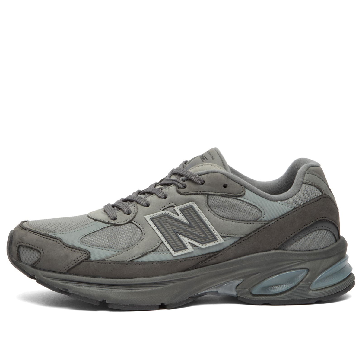 Comme des Garçons Homme Men's x New Balance 2010V Sneakers in Grey