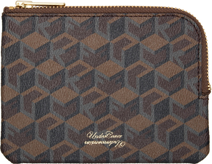 Photo: UNDERCOVER Brown UCU9P91-01 'Fuck' Pattern Pouch