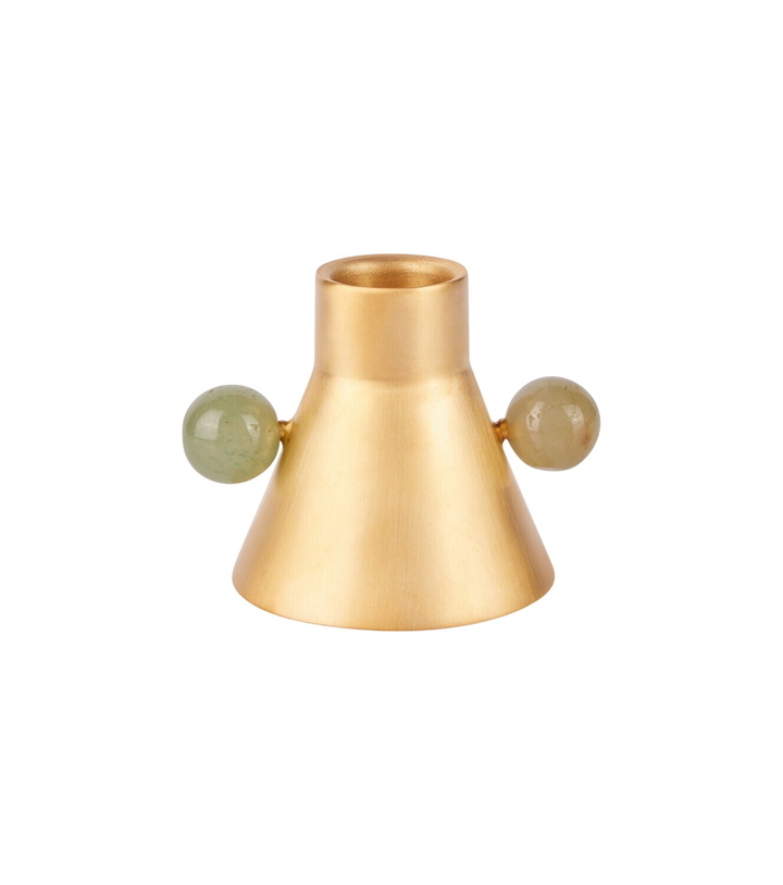 Photo: Natalia Criado Gold-plated candle holder