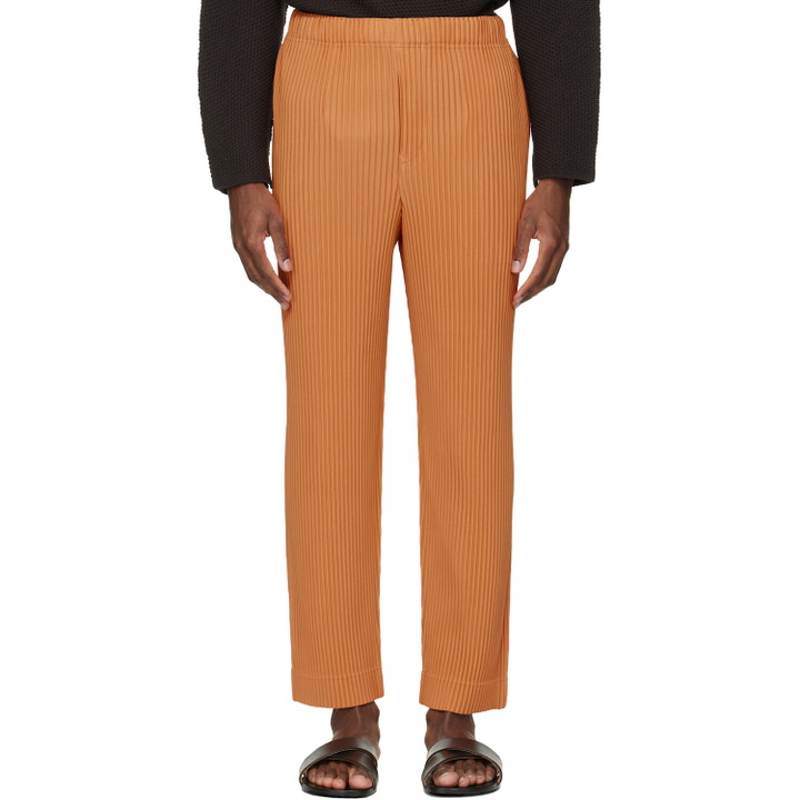 Photo: HOMME PLISSÉ ISSEY MIYAKE Orange Monthly Colors March Trousers
