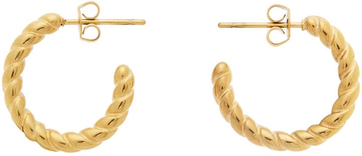 Photo: Sporty & Rich Gold Twisted Hoop Earrings