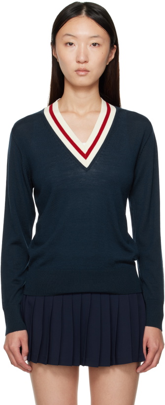 Photo: Sporty & Rich Navy 'SRC' Minimalist V-Neck Sweater
