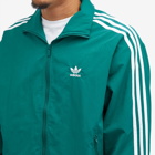 Adidas Men's Woven Firebird Track Top in Legacy Teal