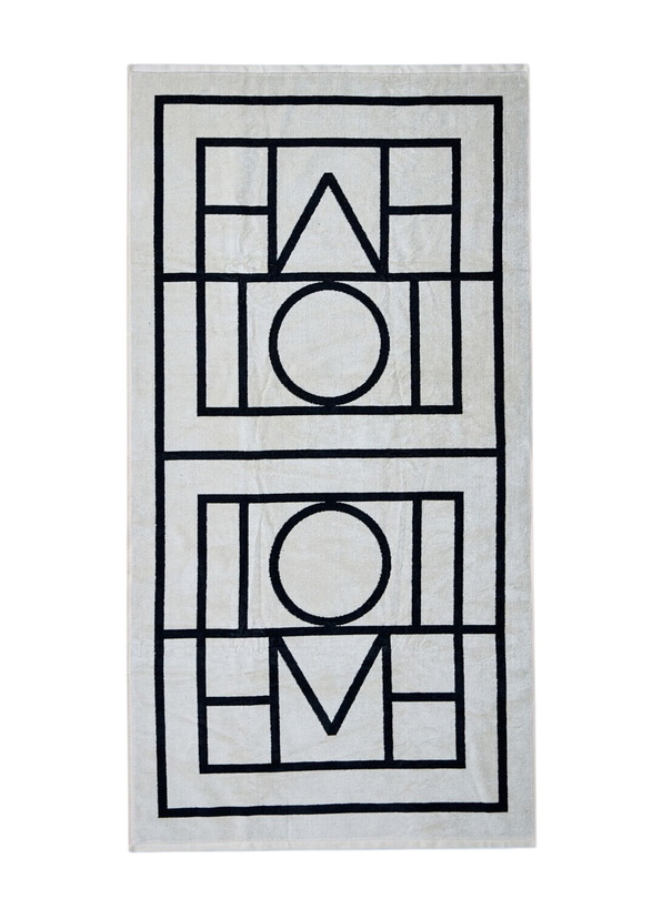 Photo: TOTEME Monogram Beach Towel