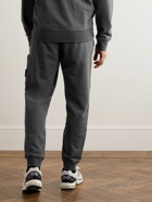 Stone Island - Tapered Logo-Appliquéd Garment-Dyed Cotton-Jersey Sweatpants - Gray