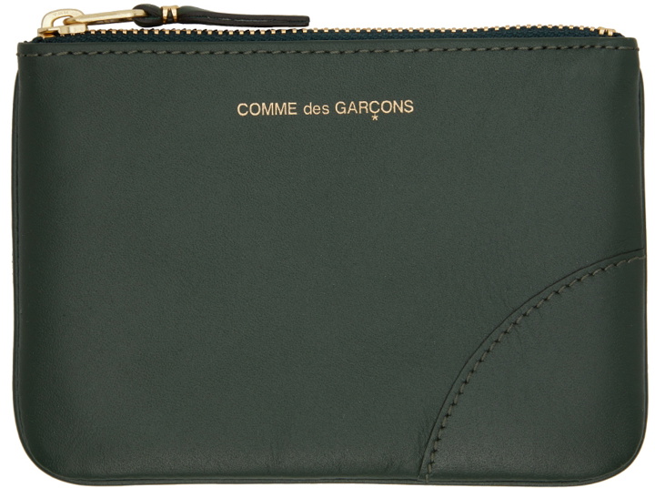 Photo: COMME des GARÇONS WALLETS Green Leather Line Wallet